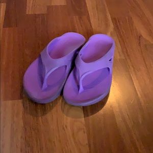 Purple flip flops